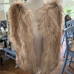BB Dakota furry vest size Medium. Worn one time. Pet free, smoke free home.